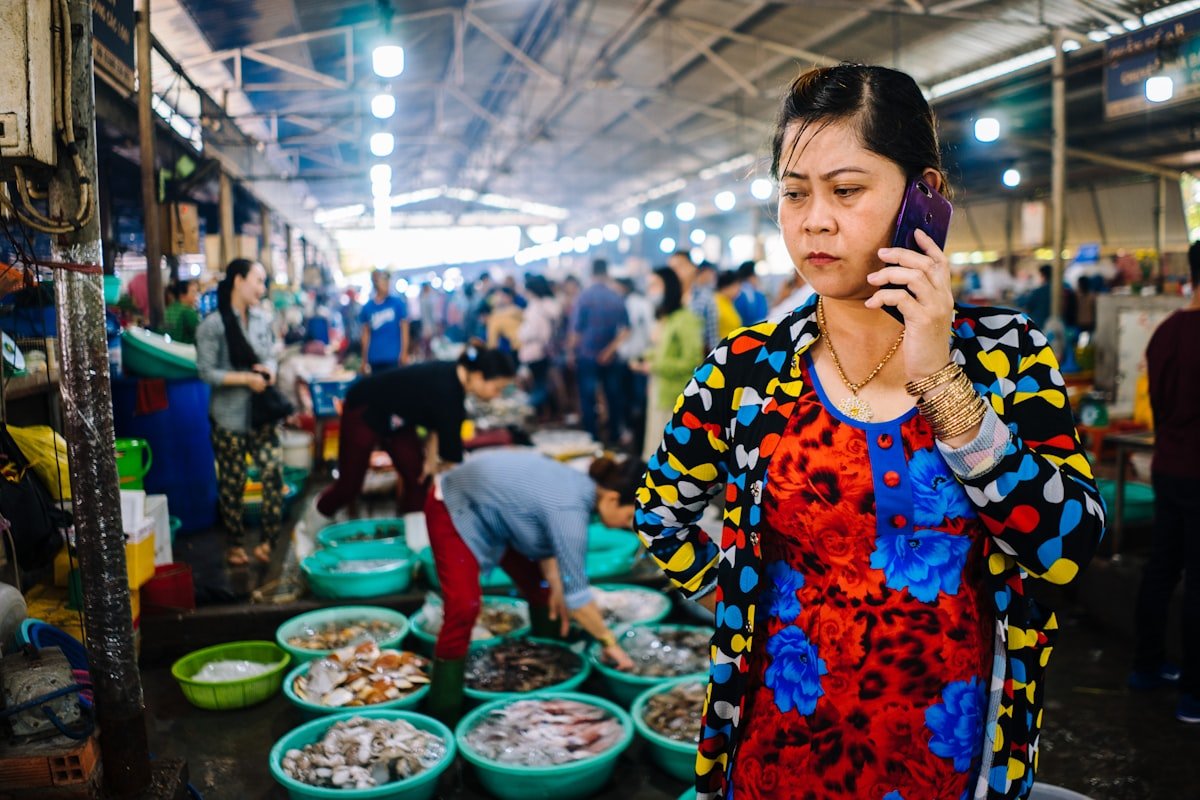 How India beat China to become the biggest smartphone maker for the US - Boss lady at a seafood market outside of Saigon
