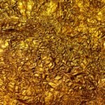 3 men convicted for stealing ancient gold coins in 9-minute museum heist - Gold foil background