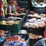 Bank of England cuts interest rates amid warnings that food costs could push inflation higher - None