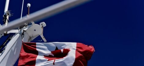 Canada will match U.S. tariff exemptions under the USMCA trade pact, according to Prime Minister Carney. - Canadian Flag