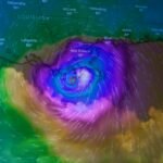 Erin rapidly intensifies into a monstrous Category 5 hurricane - Double exposure of Hurricane Ida approaching New Orleans on August 29, 2021.