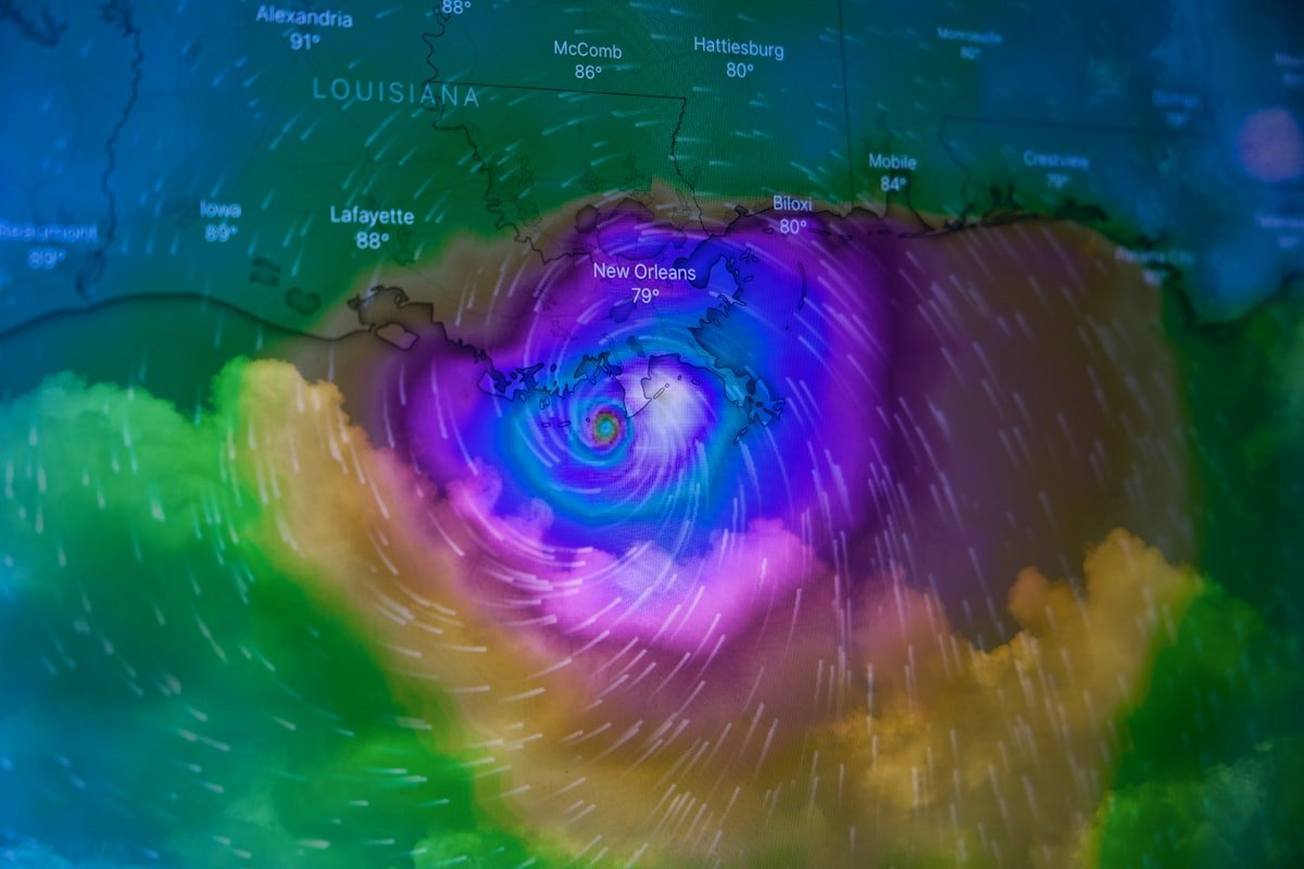 Erin rapidly intensifies into a monstrous Category 5 hurricane - Double exposure of Hurricane Ida approaching New Orleans on August 29, 2021.