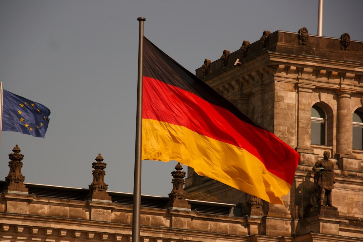 German Minister says China 'increasingly aggressive. - The German flag at the Reichstag building.