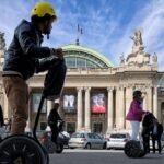 Germany to host the ITS World Congress 2025, showcasing smart mobility solutions. - Tourist on a city tour of Paris by Segway passing in front of the Grand-Palais