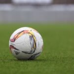 Man arrested after footballer 'racially abused' during first Premier League match of season - Adidas soccer ball on a grass pitch