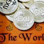 Mastercard and Worldpay team to streamline UAE money movement - A pile of EXU coins on top of a map