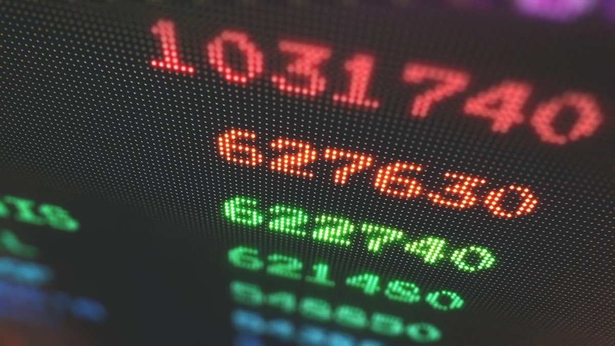 US Stock Market Today: Microsoft, Meta earnings lift Nasdaq to a record level - Arcade machine high score board in a rainbow pattern.