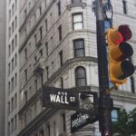 Wall Street suffers biggest drop since May after hiring slowdown and new tariffs - Wall St and Broadway signs